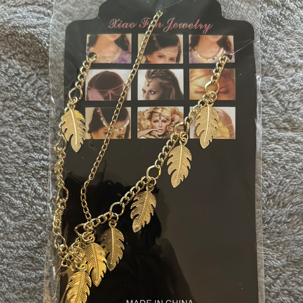 Gold Leaf Charm Head Chain with Cascading Design.
